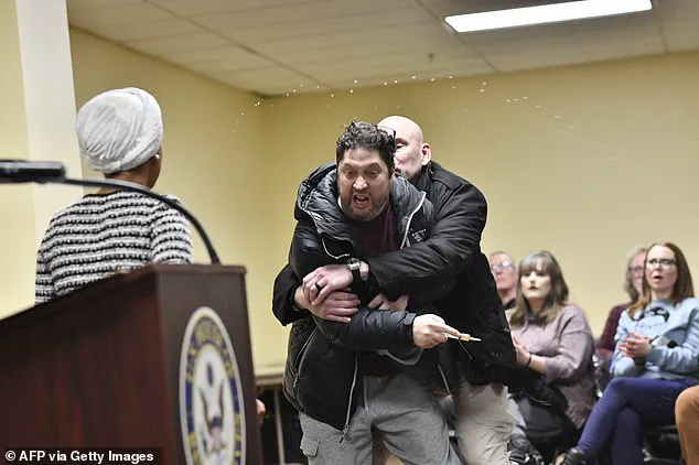 Rep. Ilhan Omar Allegedly Sprayed at Town Hall, Trump Claims Staged Attack by Trump Supporter