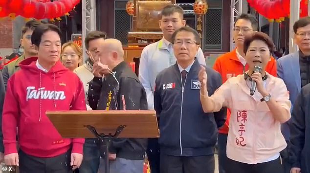 Temple Leader Vomits on Taiwan President During Lunar New Year Ceremony