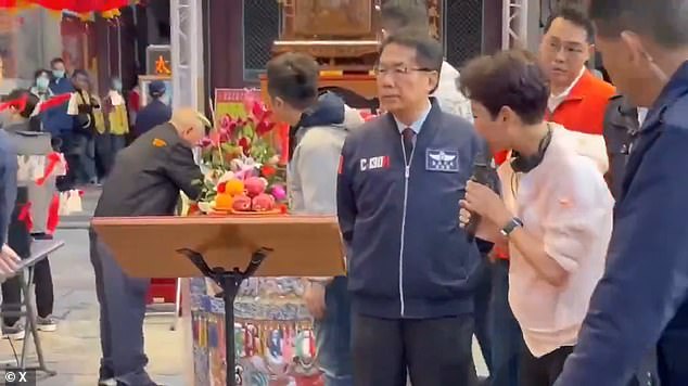 Temple Leader Vomits on Taiwan President During Lunar New Year Ceremony