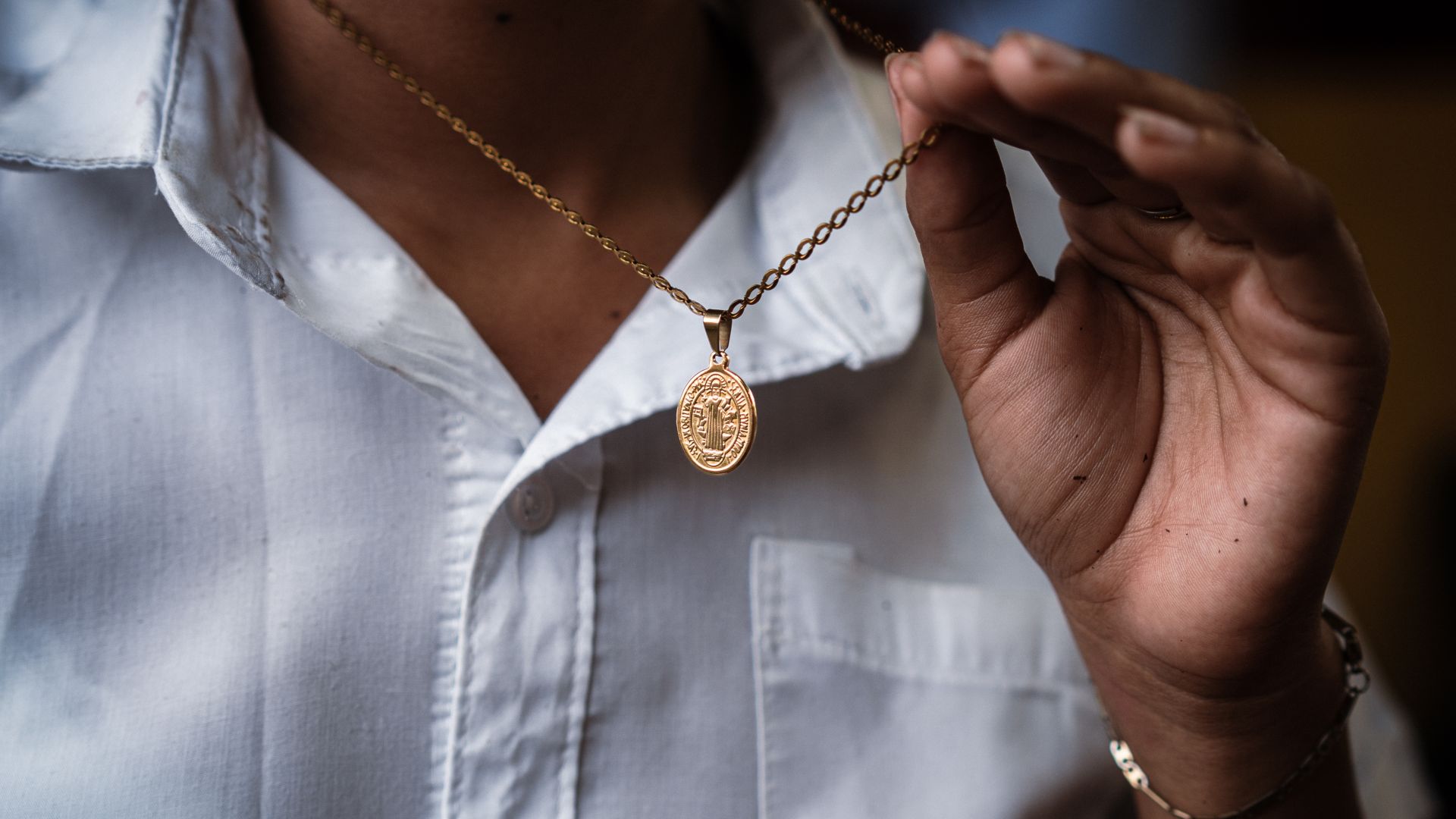 A Gold Chain of Protection and Grief: El Salvador's Forgotten Families