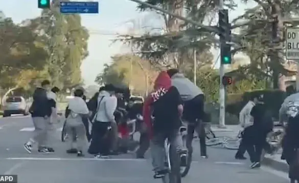 Disturbing Video Shows Mob of Teen Cyclists Beating Up a Driver in Los Angeles