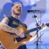 Country Stars Zach Bryan and John Moreland's Feud Over $350M Deal Leads to Removal of Collaborative Track