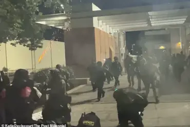 Chaos Erupts at Portland ICE Facility as Protesters Storm Holding Cells, 28-Day Occupation Sparks Use of Tear Gas and Smoke Bombs