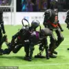 China's Ambitious Robot Football Tournament Debuts with Clumsy Performance, Raising Questions About AI's Role in Sports